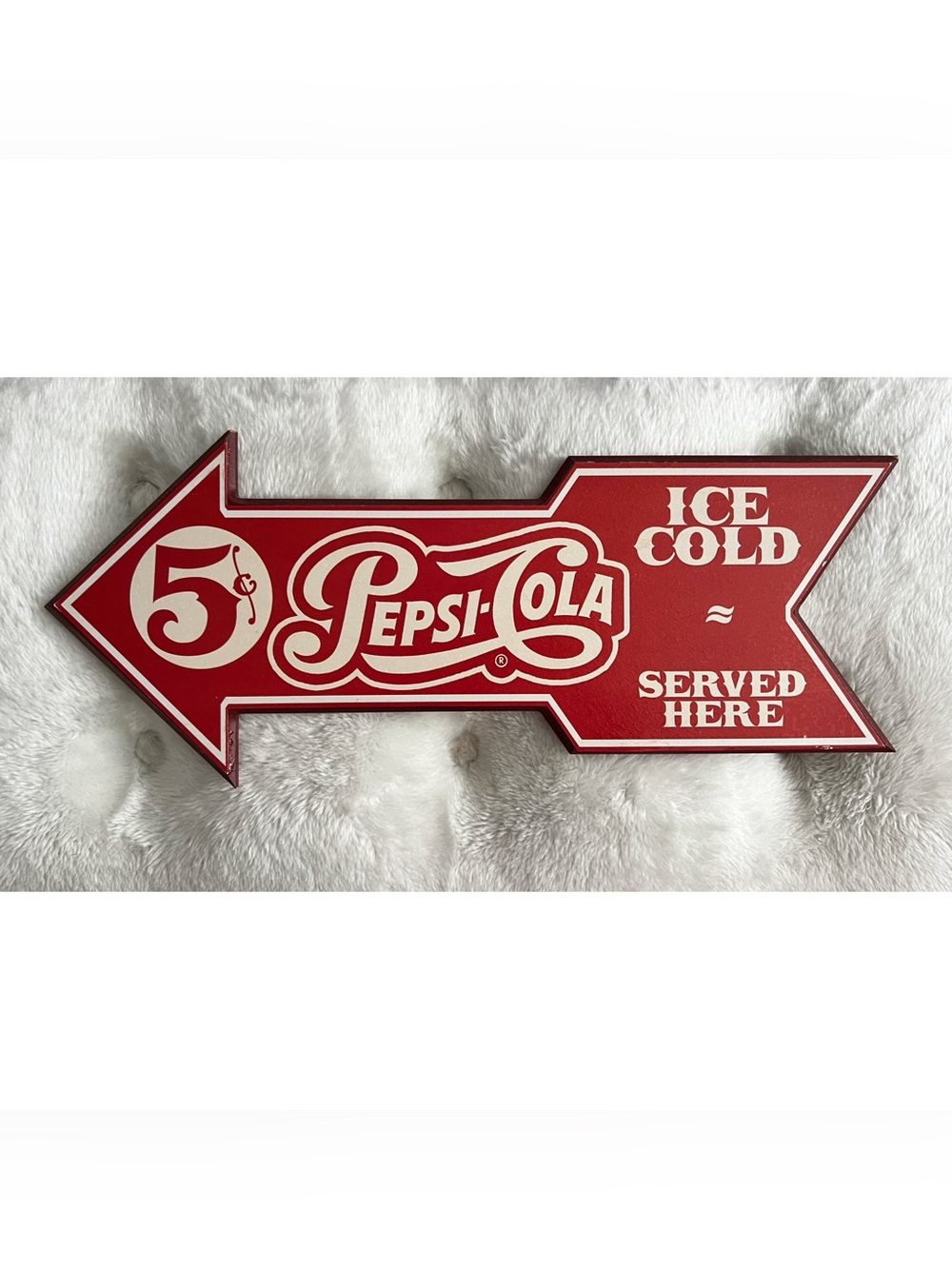 Pepsi Cola arrow sign